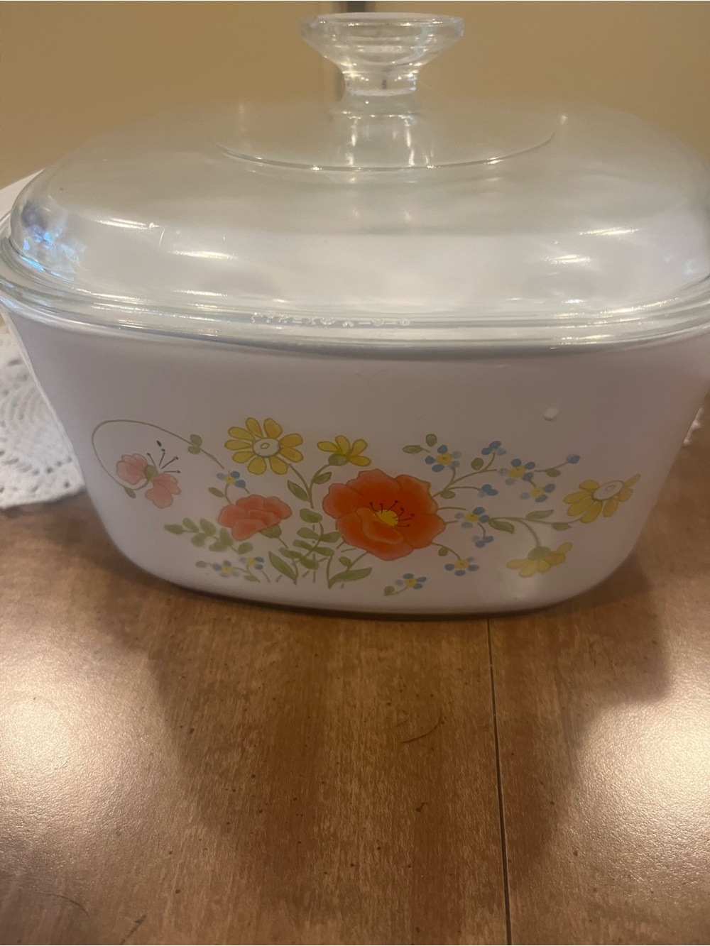 White Floral Covered Casserole Dish with Orange & Yellow Flowers